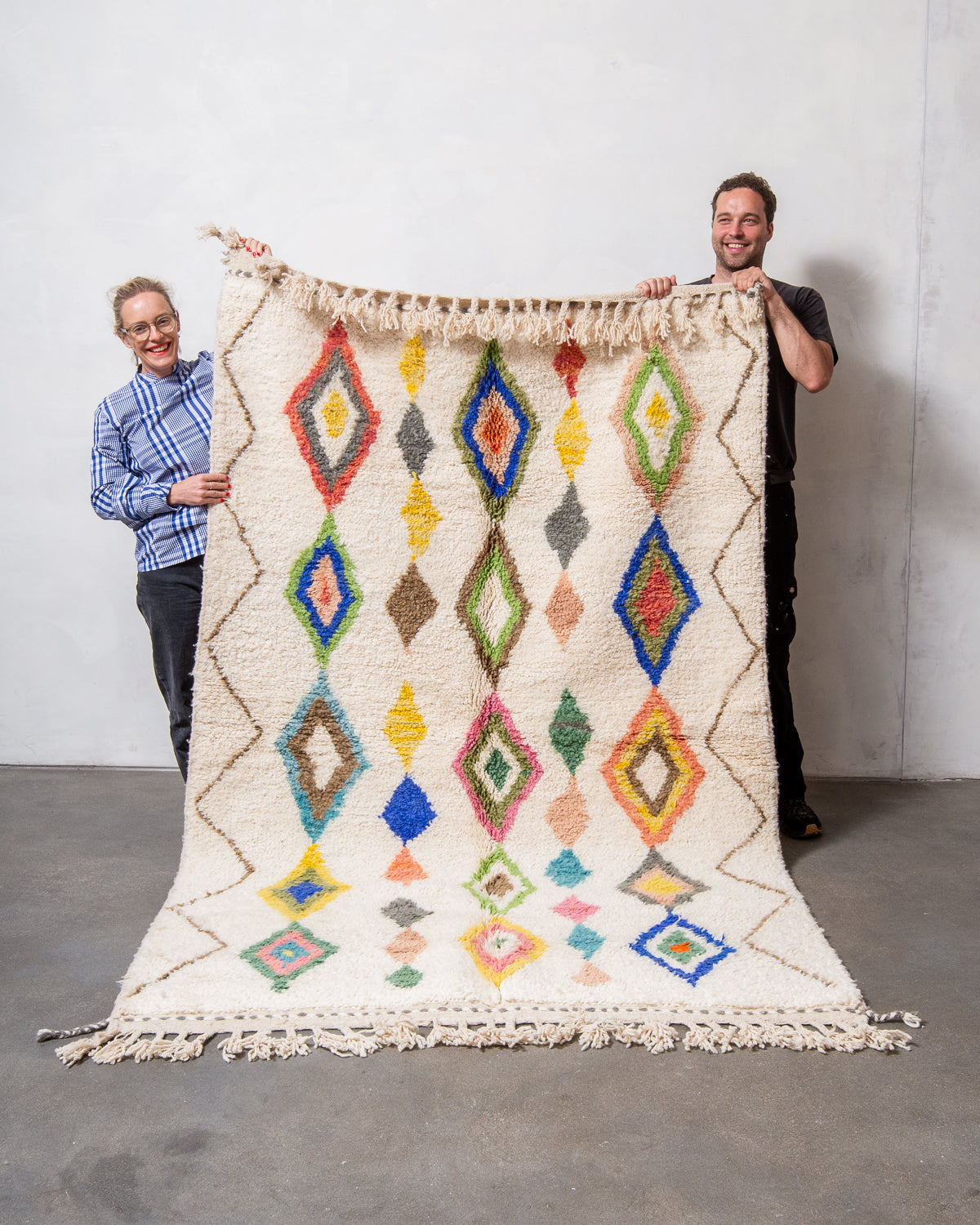Modern, designer, handcrafted Berber rug from Morocco. Beniourain carpet with beautiful colours and patterns and fluffy wool texture.